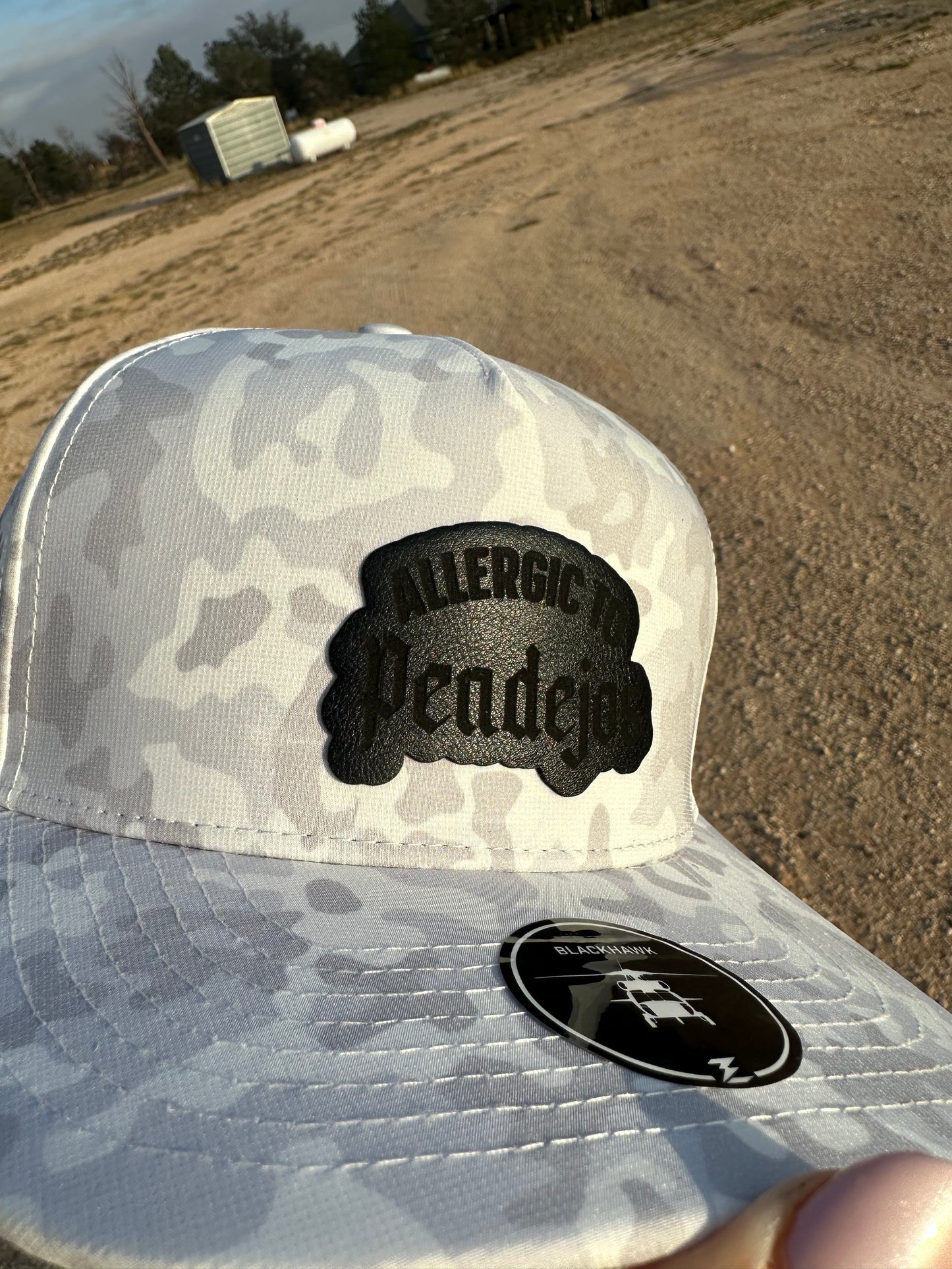 ENGRAVED PATCH ON A PERFORMANCE HAT